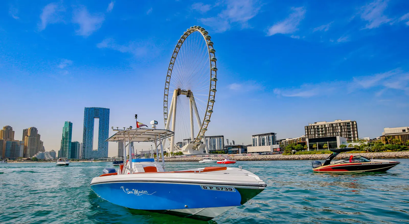 Xclusive Boat Club boat on the water in Dubai